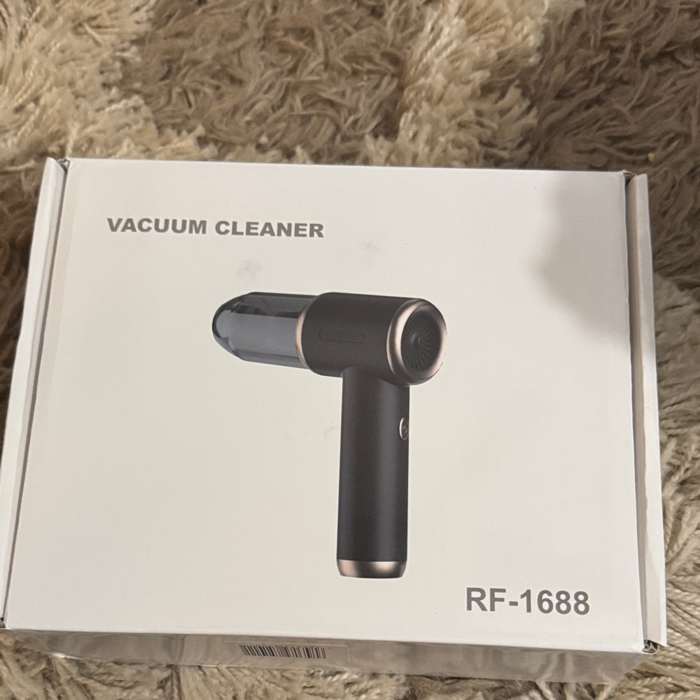 Black and Gold Handheld Wireless‎ Vacuum Cleaner